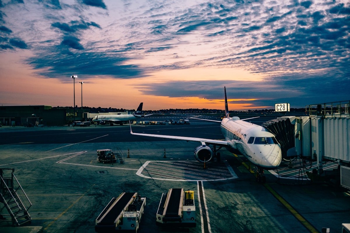 Commercial aircraft flying through open sky